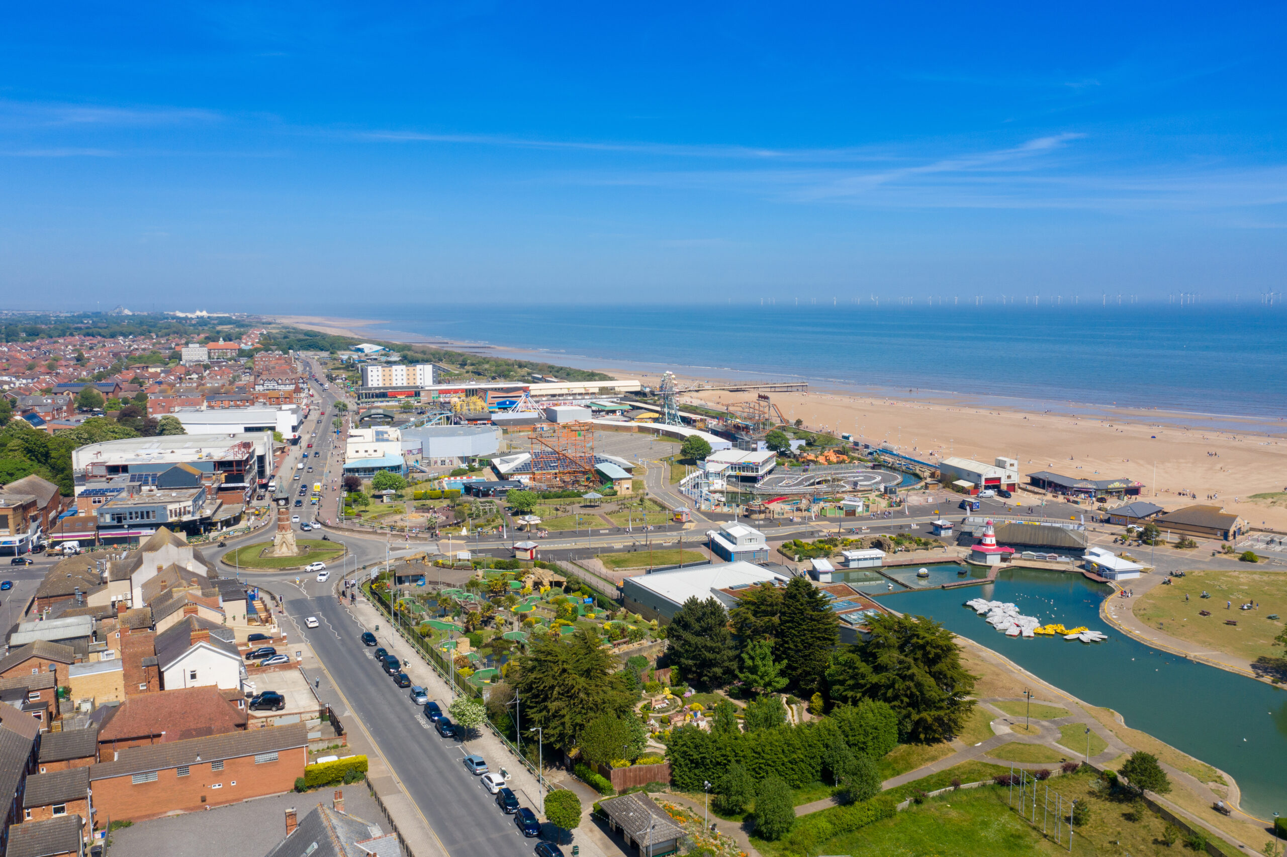 Image of a aerial picture of a beach and neighbouring village in Skegness where we provide Pat Testing