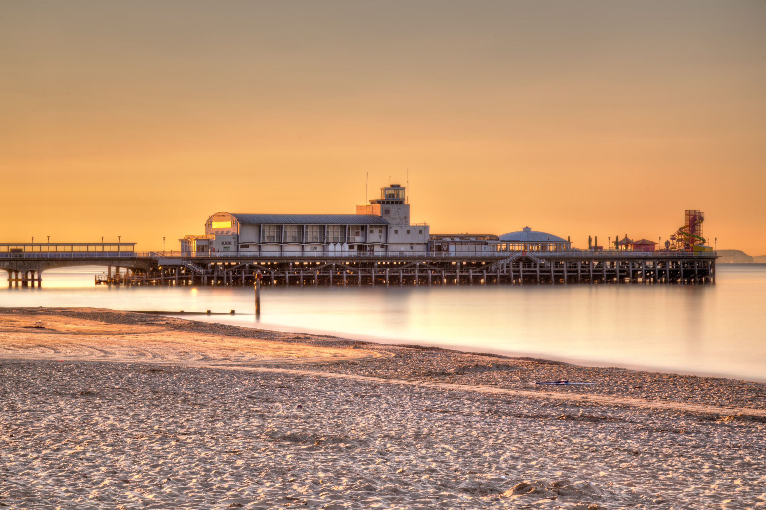 Picture of sun set over Bournemouth Pier where we provide Pat Testing