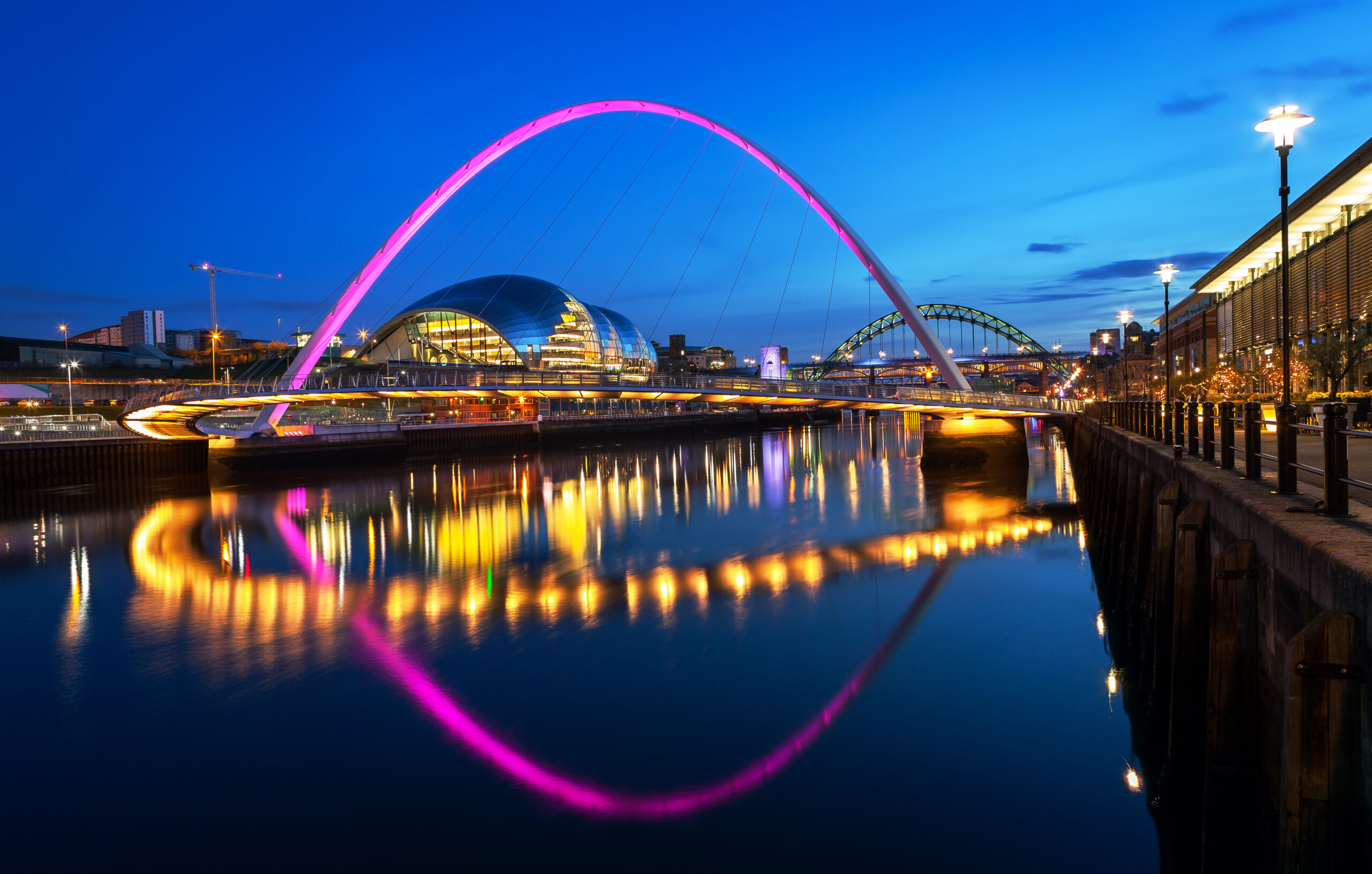 Image of a lake at nigh time in Newcastle where we do Pat Testing