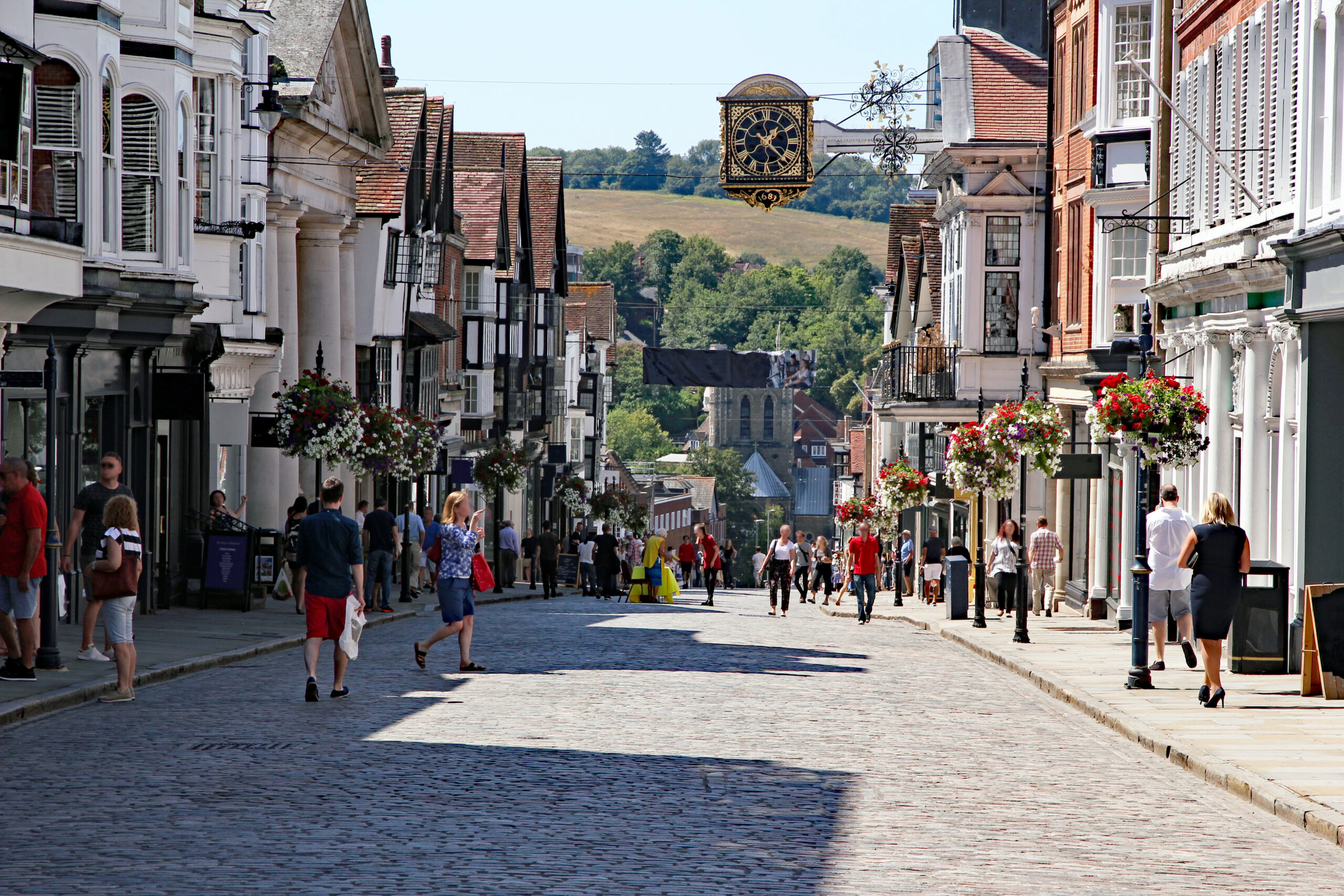 Guildford’s cobbled high street bustling with anonymised shops