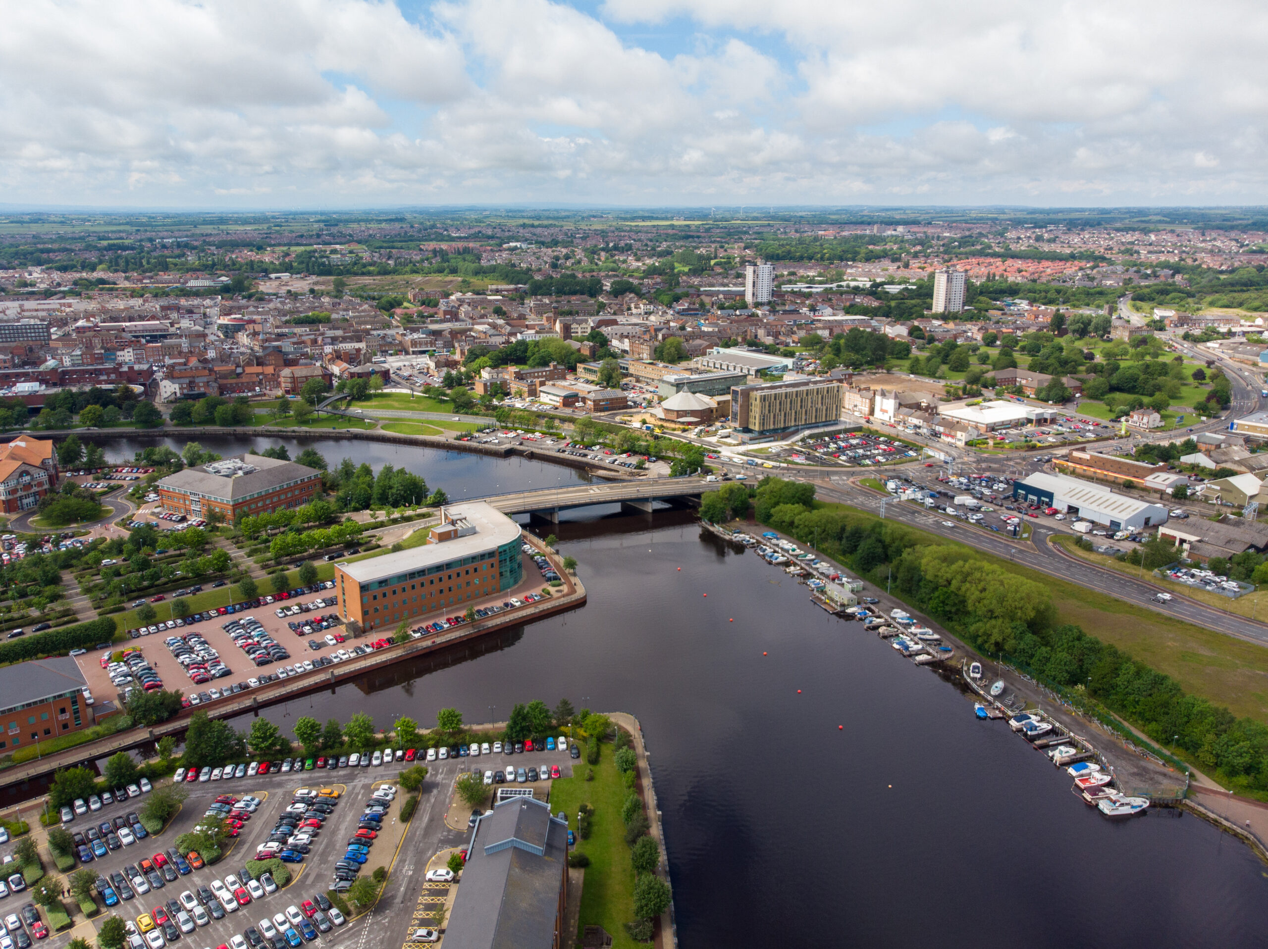 Aerial photo of the River Tee in Middlesbrough a large post-industrial town in the county of North Yorkshire, England, taken on a bright sunny day